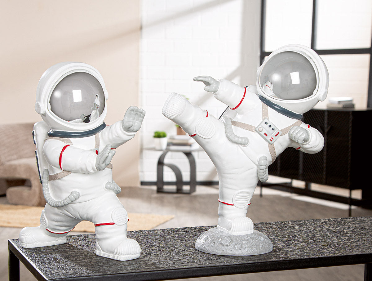 Gilde astronaut figure with karate pose, resin material, detailed hands and space helmet, collectible sci-fi figurine.