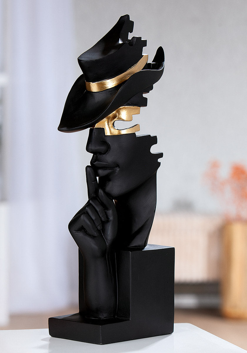 Gilde Mystique Resin sculpture of a hand and head in black with detailed artistic design.