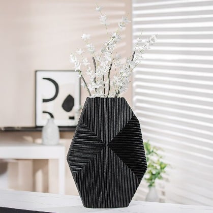 Black Gilde Heptagon Resin Vase, 28cm tall, with a geometric design and smooth finish, perfect for modern home decor.