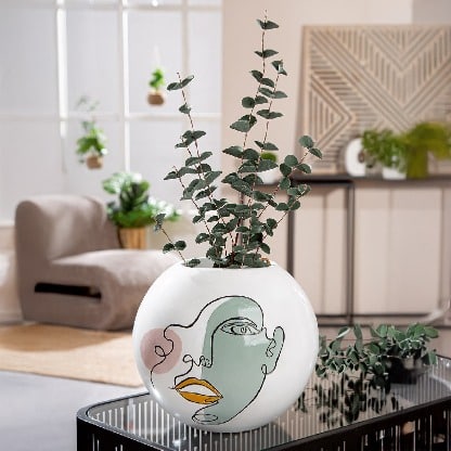 White Gilde Vase with ball-shaped face motif, 22cm resin decorative piece, featuring unique facial design and smooth surface.