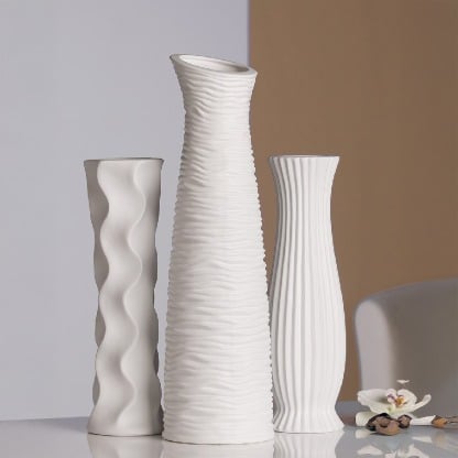 White ceramic Gilde Wave Vase, 46cm tall, with a sleek, modern design and smooth wave pattern.