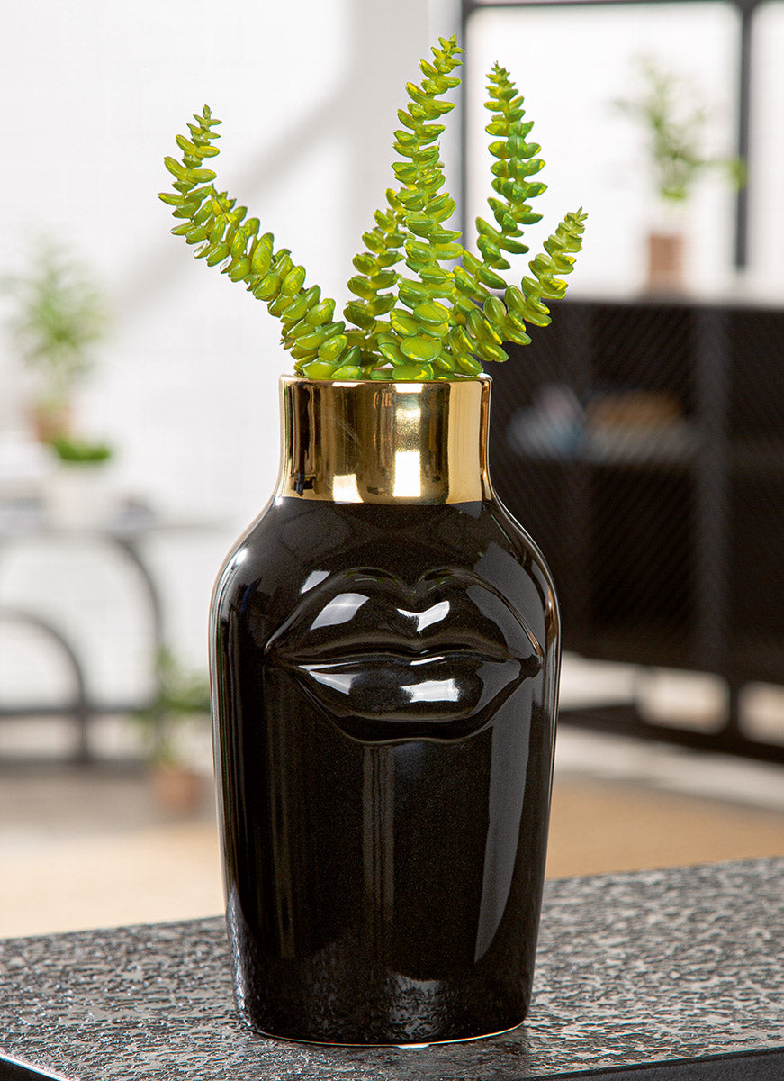 Black Gilde ceramic vase with mouth motif, 20.5cm tall, featuring intricate design and glossy finish.
