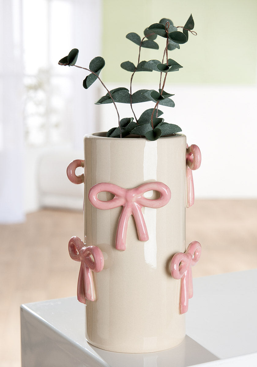 Cream Gilde Vase with bow loop design, 20.5cm tall, crafted in ceramics, featuring elegant and decorative craftsmanship.