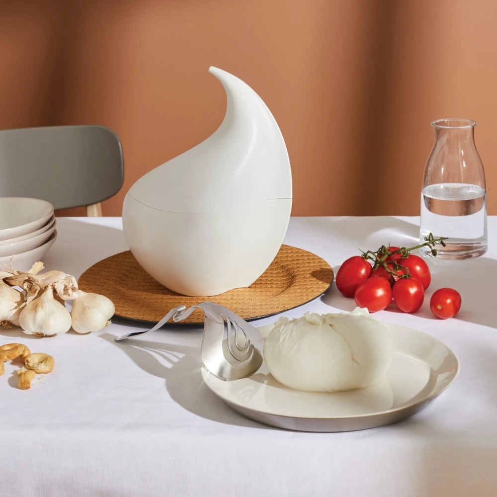 Alessi Nunziatella perforated ladle with stainless steel handle and perforated bowl for serving soups and broths.