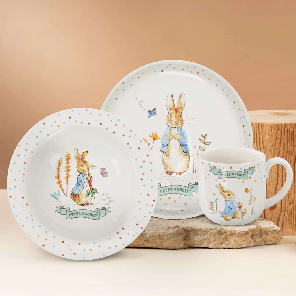 Beatrix Potter ceramic dinner set with three pieces featuring colorful illustrations of beloved characters, perfect for kids' mealtime.
