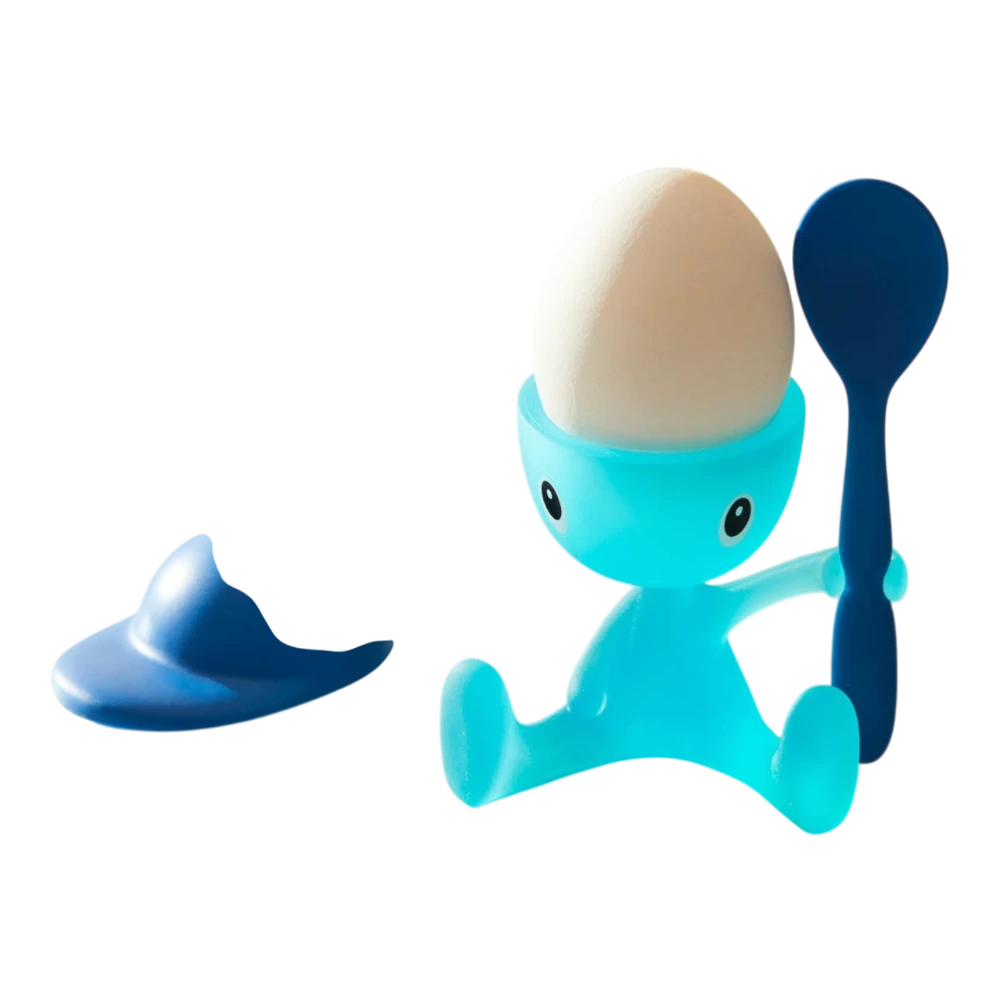 Pink Alessi Cico egg cup with matching spoon, featuring a playful, modern design on a white background.