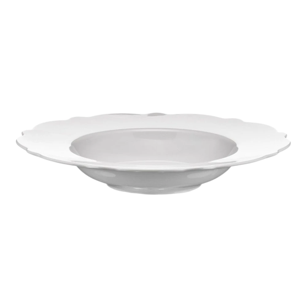 Alessi porcelain soup bowl with dressed design, round shape, smooth white finish, suitable for serving soups or stews.