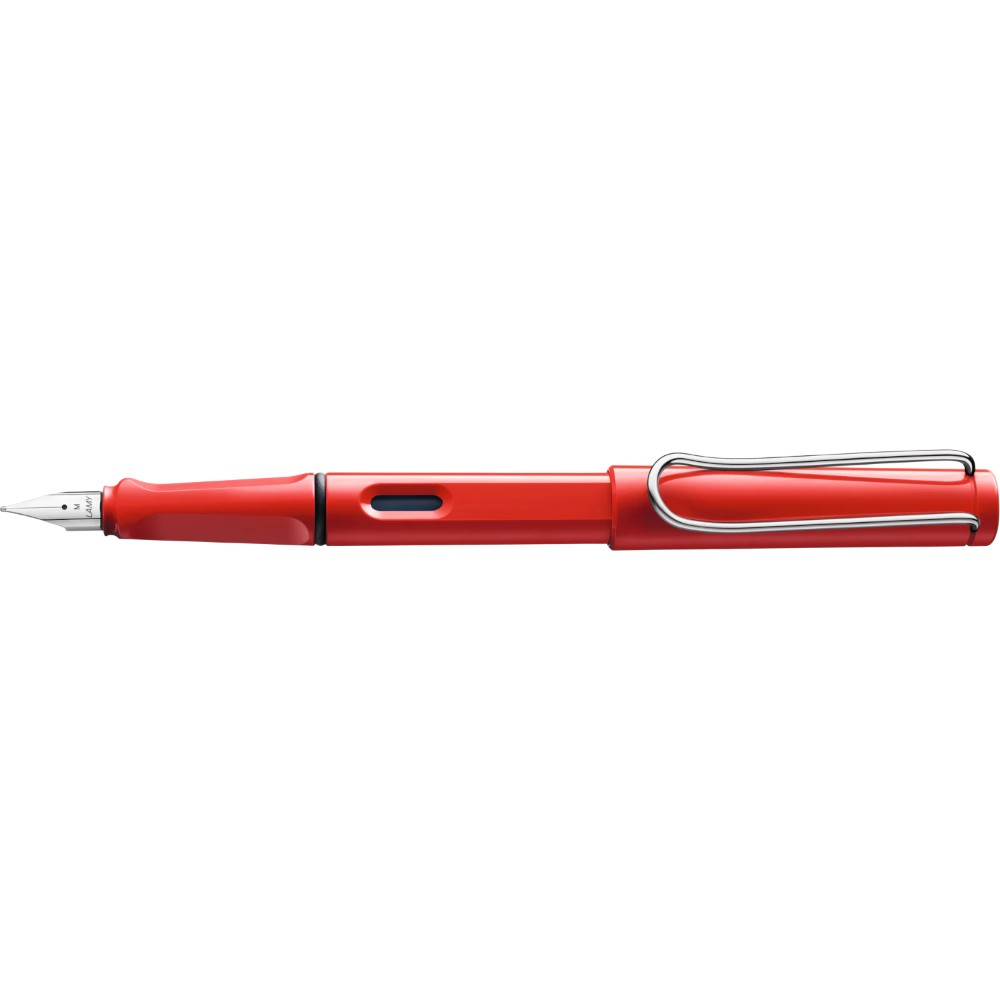 Lamy Safari fountain pen with a vibrant green barrel and matching cap, featuring a silver clip and nib.