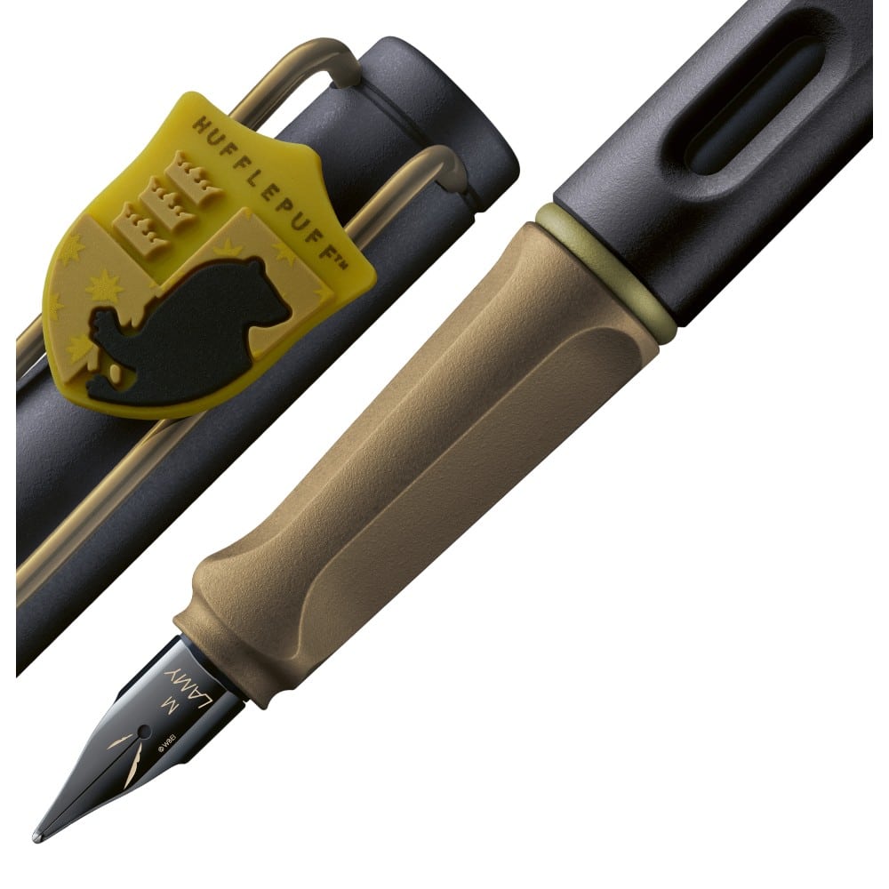 Lamy x Harry Potter Hufflepuff Safari fountain pen with yellow and black design, featuring Hufflepuff emblem and Harry Potter branding.