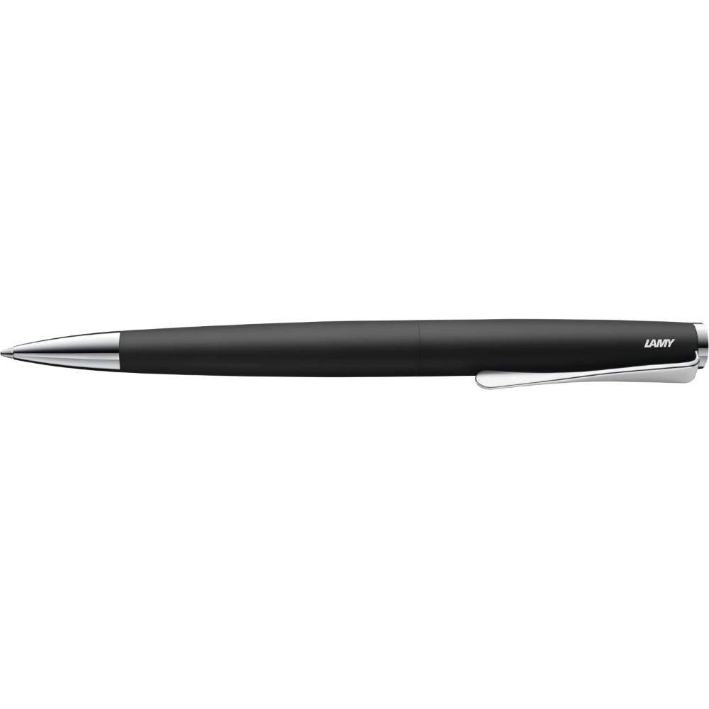 Lamy Studio ballpoint pen with sleek black body and chrome accents, resting on a white surface.