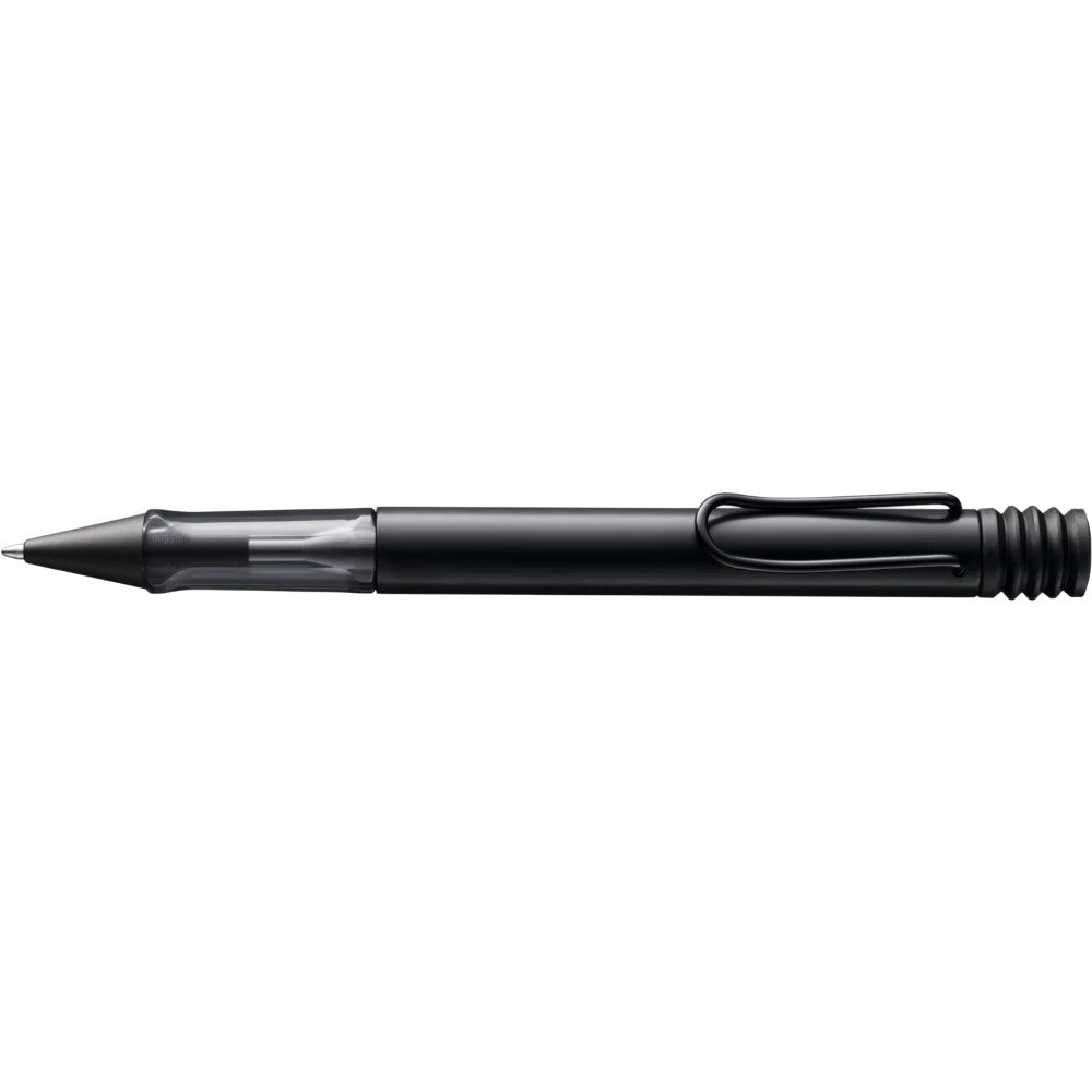 Lamy AL-star ballpoint pen with silver aluminum body and black grip, featuring a retractable tip and modern design.
