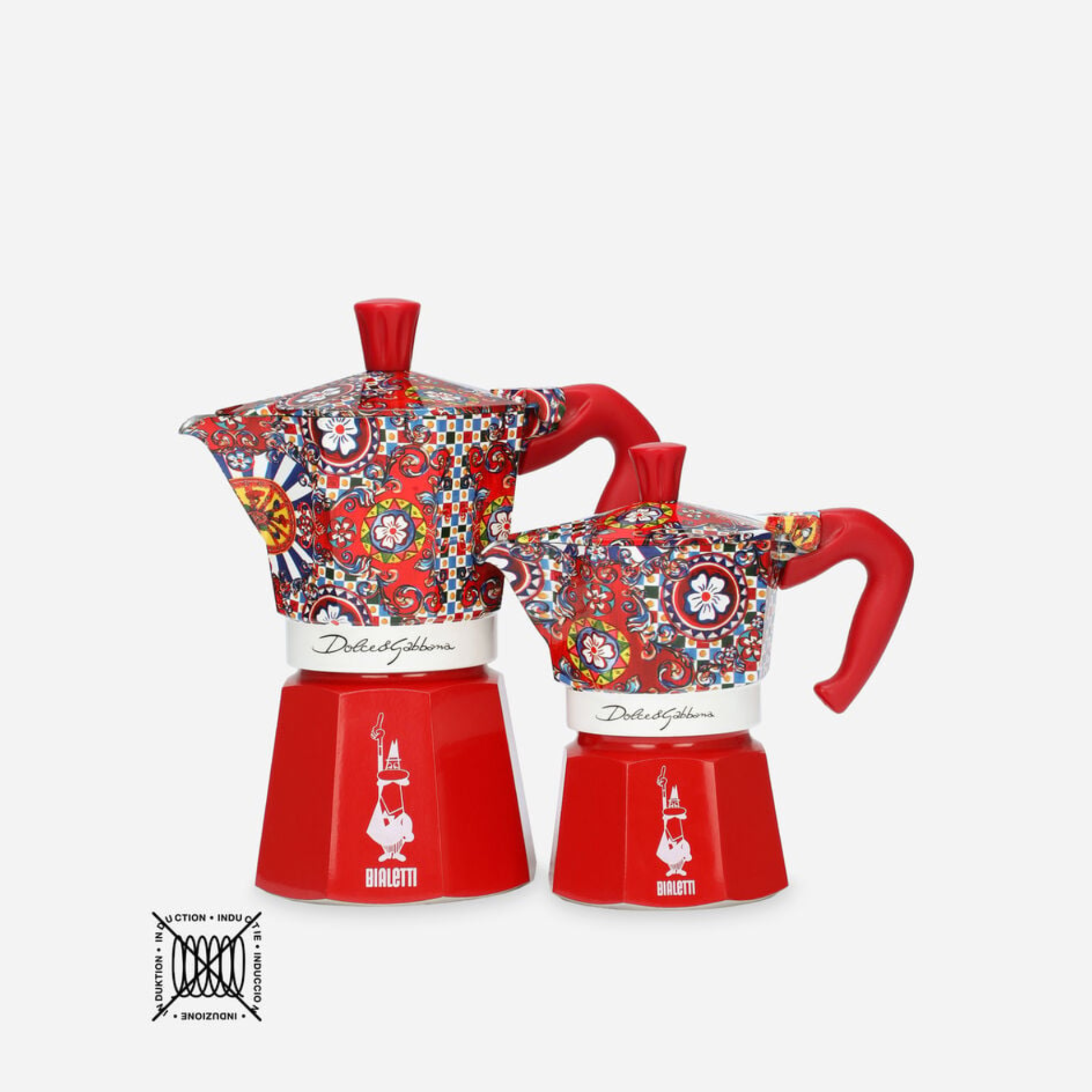 Red Bialetti Espresso Coffee Maker Mediterraneo Dolce & Gabbana with sleek design and metallic finish on a white background.