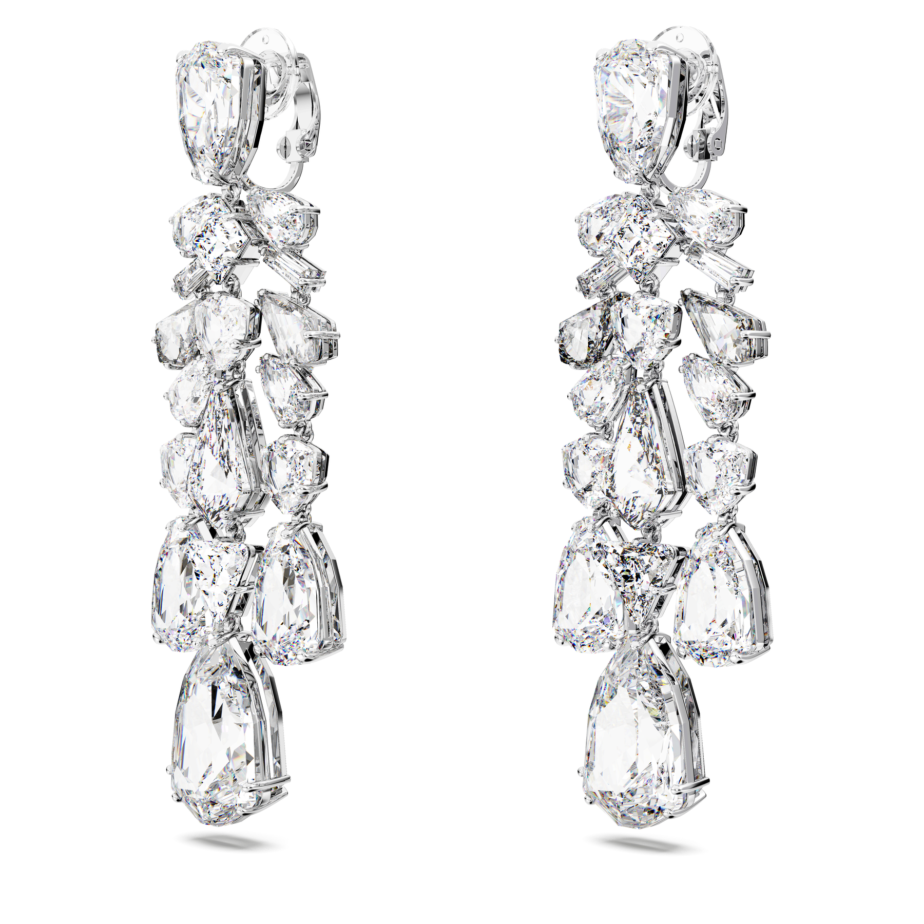 Swarovski Mesmera clip earrings with white crystals, mixed cuts, chandelier style, rhodium-plated finish, elegant jewelry accessory