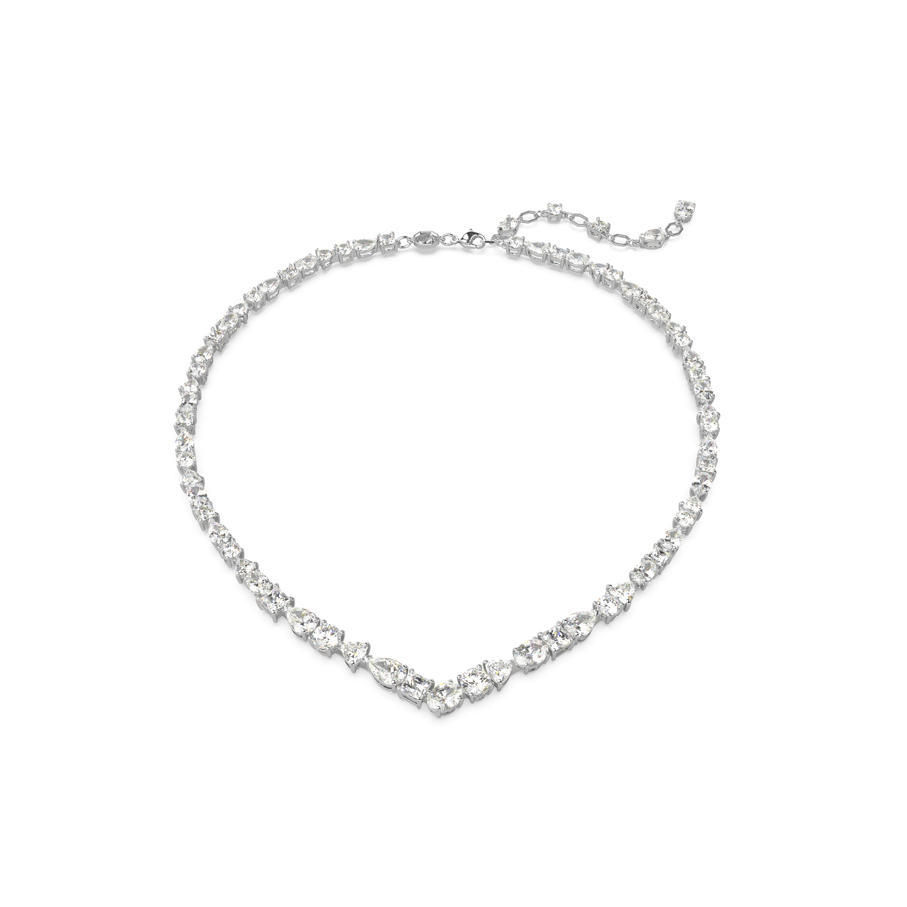 Swarovski Mesmera jewelry set with mixed cut white crystals, rhodium-plated, featuring earrings and necklace on a display stand.