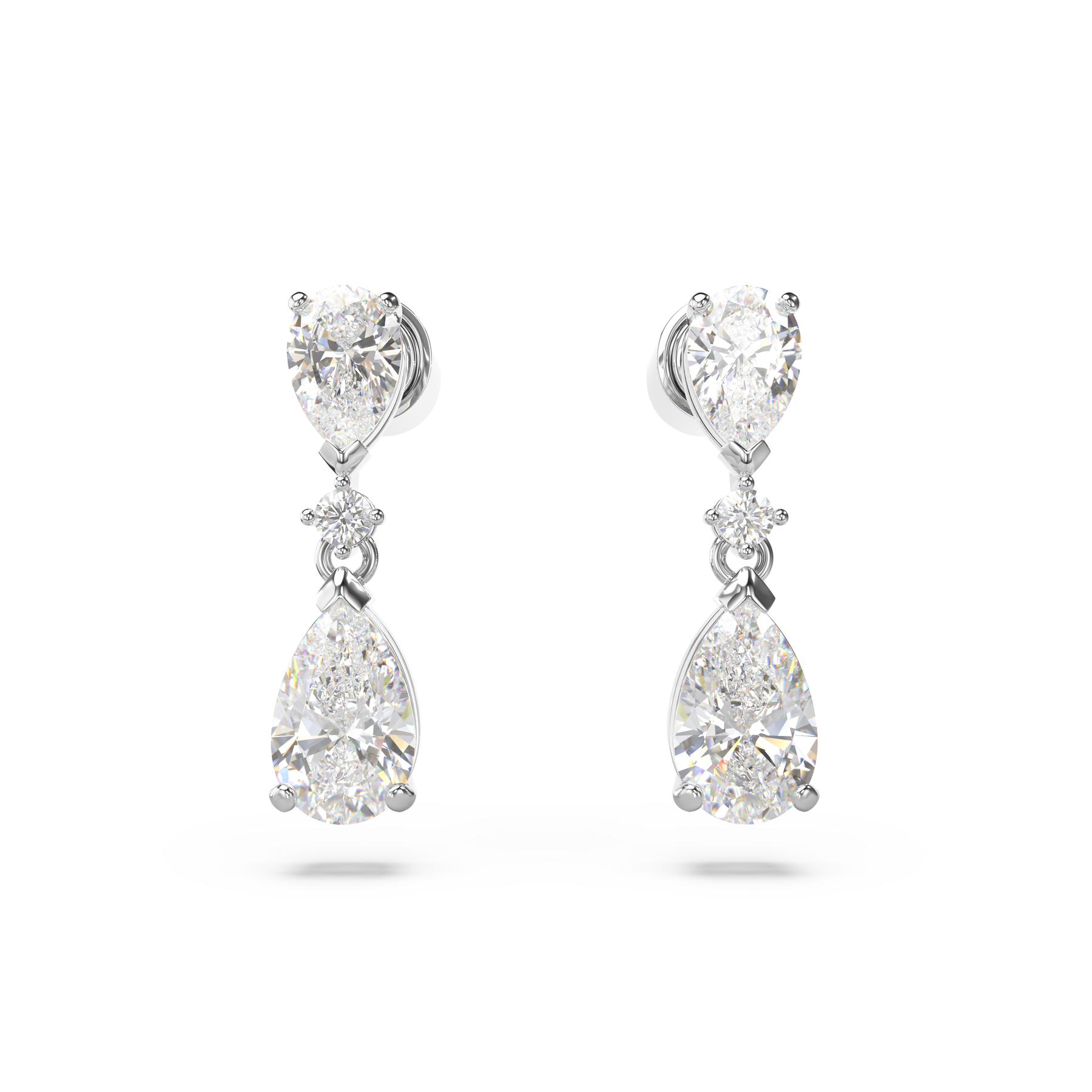 Swarovski Mesmera jewelry set with mixed cut white crystals, rhodium-plated design, featuring elegant earrings and matching necklace.
