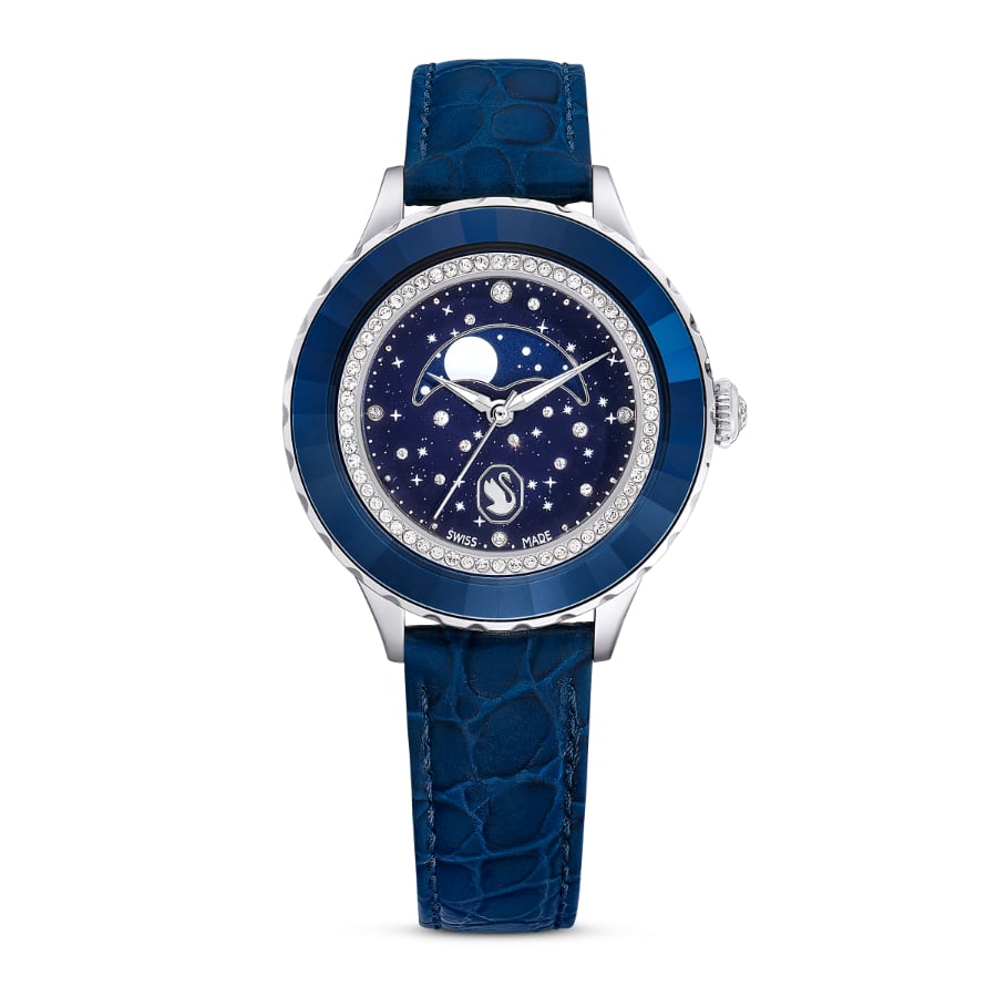 Swarovski Octea Moon watch with blue leather strap and Swiss made movement, featuring a moon-themed dial design.