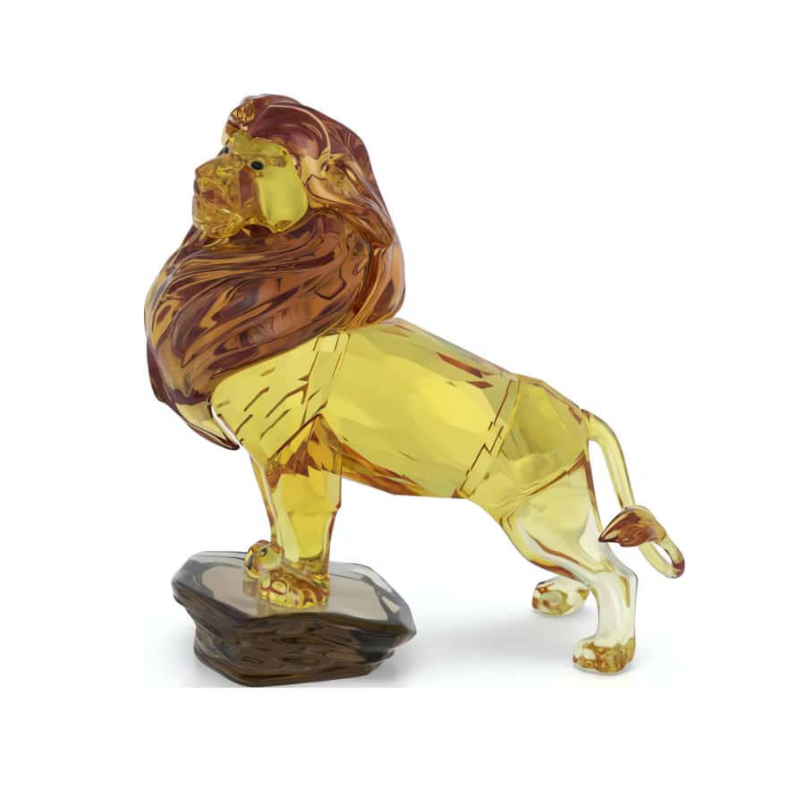 Swarovski Mufasa Lion King figurine with detailed crystal craftsmanship, showcasing a majestic lion in a regal pose.