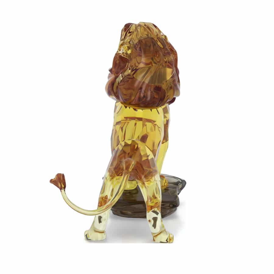 Swarovski Mufasa lion figurine from The Lion King collection, sparkling crystal sculpture with detailed features