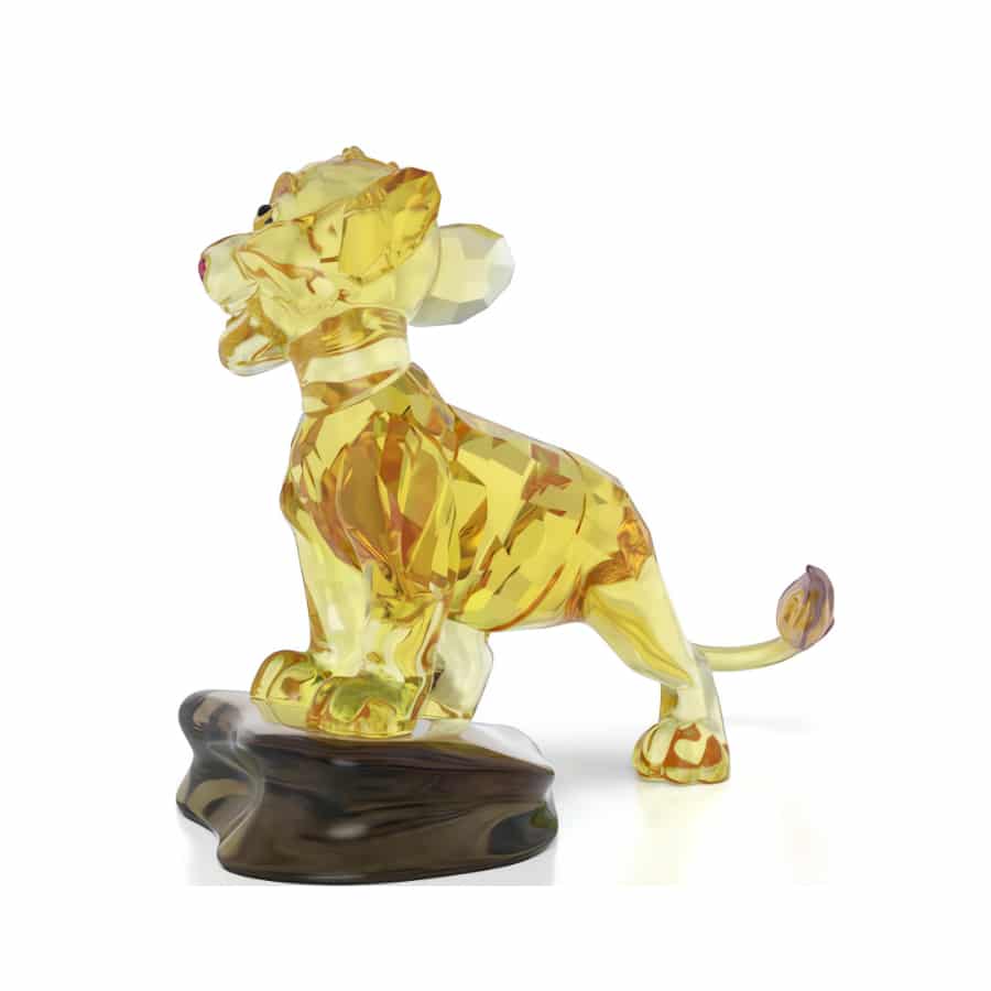 Swarovski Simba lion figurine from The Lion King collection, sparkling crystal sculpture with detailed features and majestic pose.