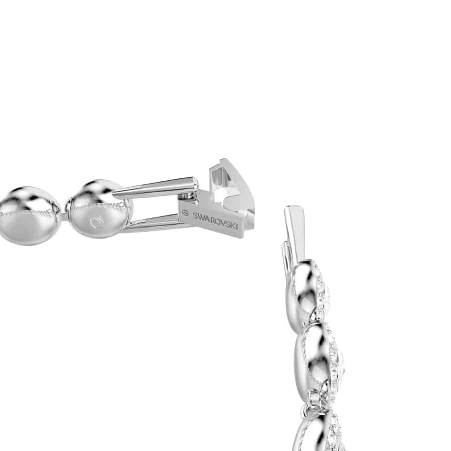 Swarovski Una bracelet featuring sparkling crystal beads and elegant silver-tone chain on a neutral background.