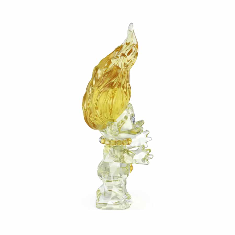 Swarovski yellow Good Luck Trolls figurine with detailed facial features and colorful hair, made of sparkling crystal.
