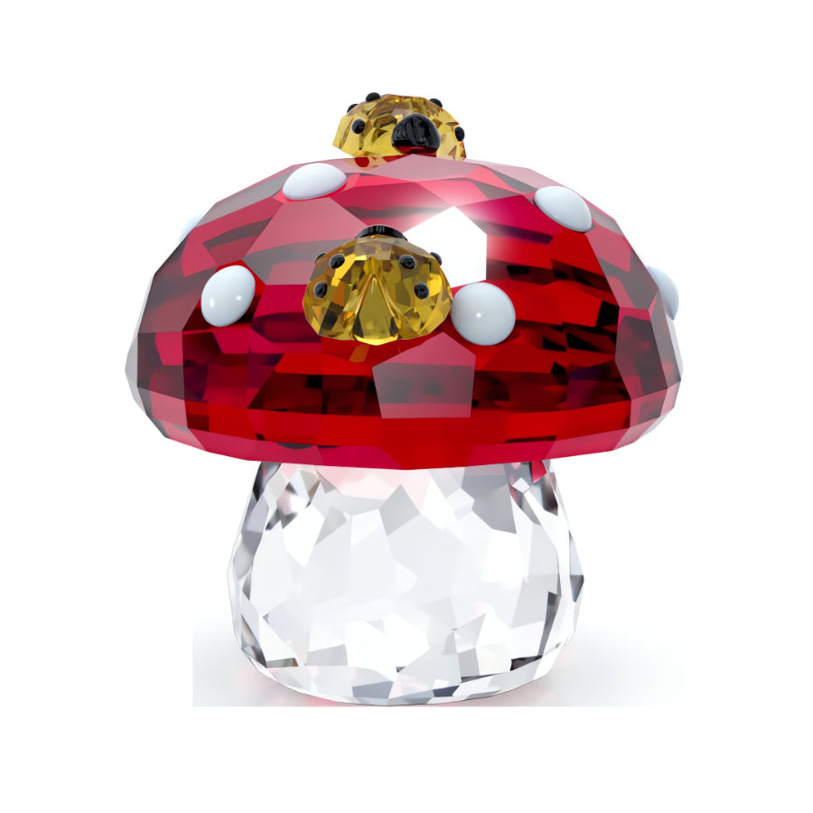 Swarovski Idyllia mushroom and ladybugs figurine with detailed crystal craftsmanship and vibrant colors.