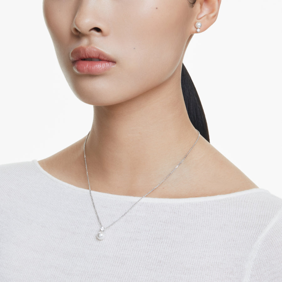 Swarovski Matrix Set with white crystal pearls and round cut stones, rhodium plated jewelry piece.