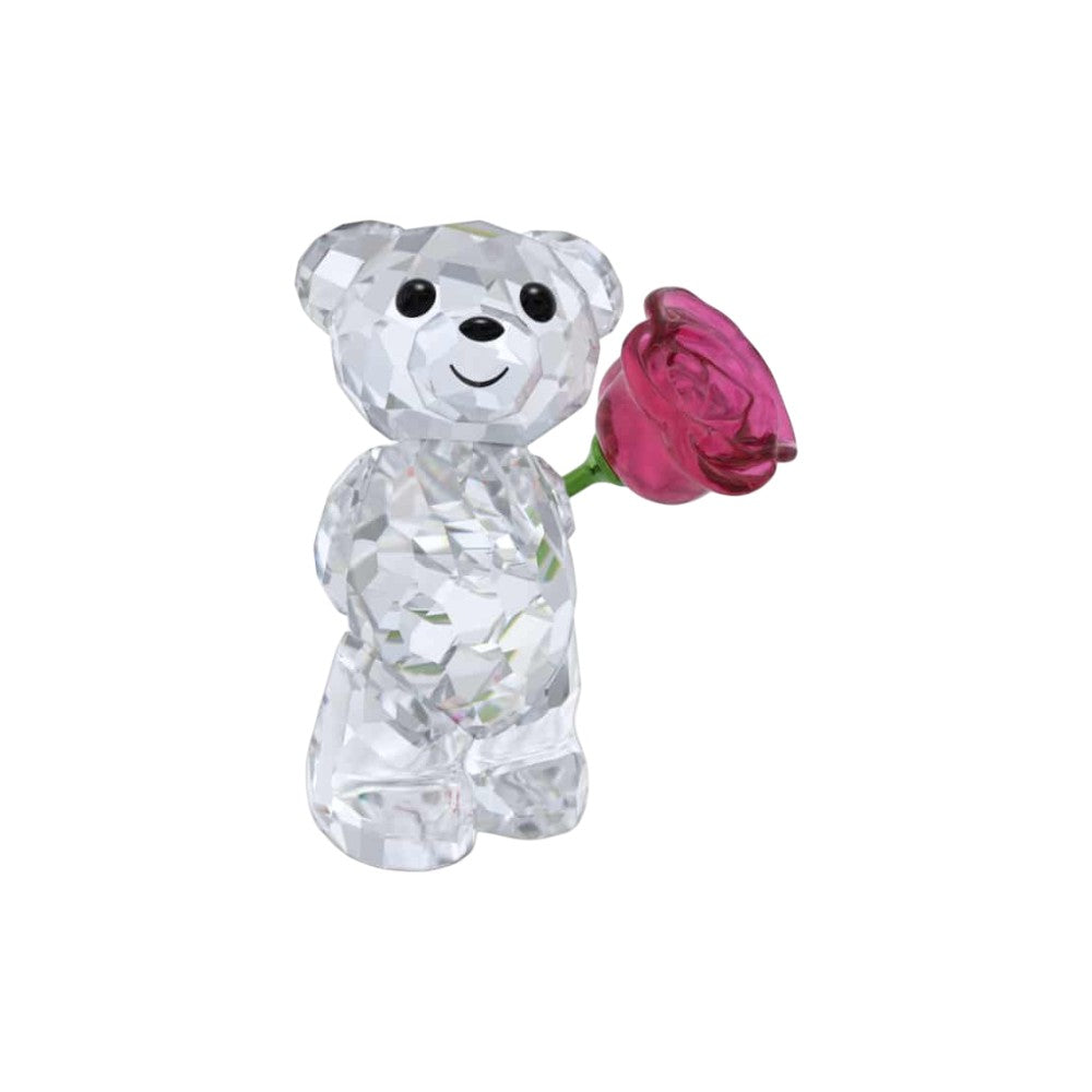 Swarovski Kris Bear figurine holding a rose, detailed crystal craftsmanship, with a love-themed design and sparkling finish.