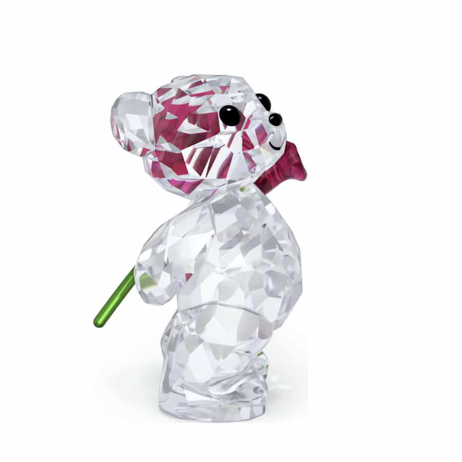 Swarovski Kris Bear with a red rose, detailed crystal figurine showcasing the Swarovski brand's craftsmanship.