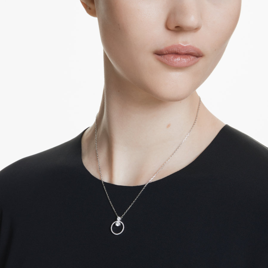 Swarovski Constella pendant with round cut white crystal, rhodium plated, elegant jewelry piece on a delicate chain