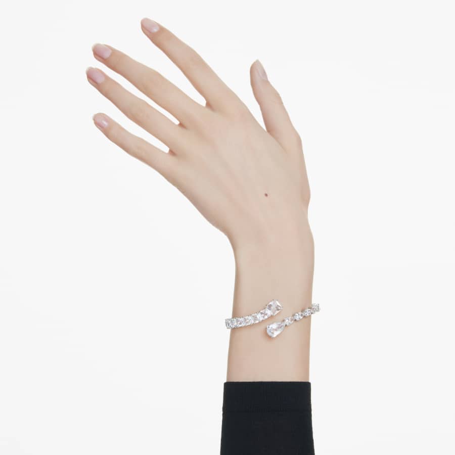 Swarovski Matrix cuff bracelet with mixed crystal cuts in white, rhodium-plated, showcasing a sleek, contemporary jewelry design.