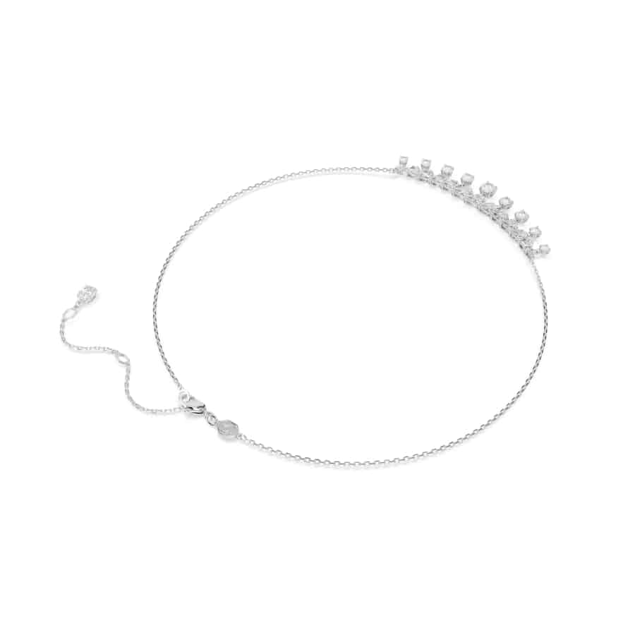 Swarovski Idyllia necklace with mixed cut snowflake-shaped white crystals and rhodium plating, elegant jewelry accessory.