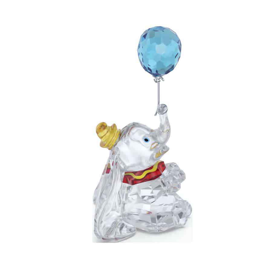 Swarovski Disney Classics Dumbo crystal figurine with detailed craftsmanship and sparkling accents on a white background.