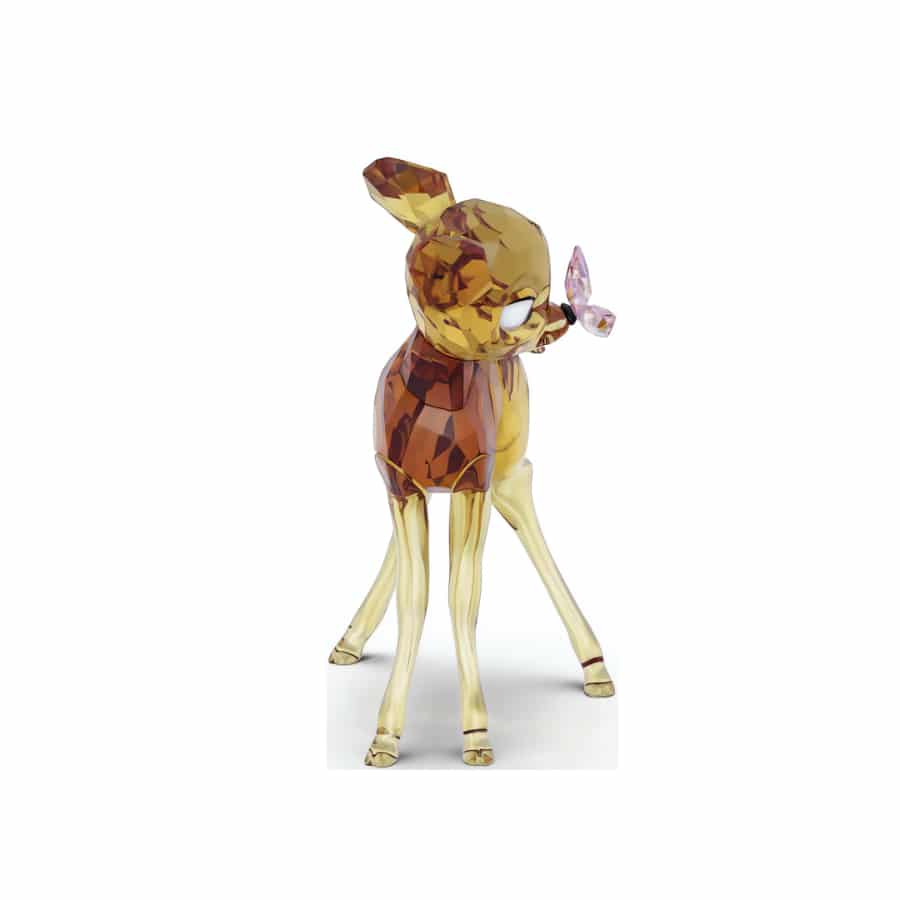 Swarovski Disney Classics Bambi crystal figurine with detailed craftsmanship and delicate design on a clear display base.