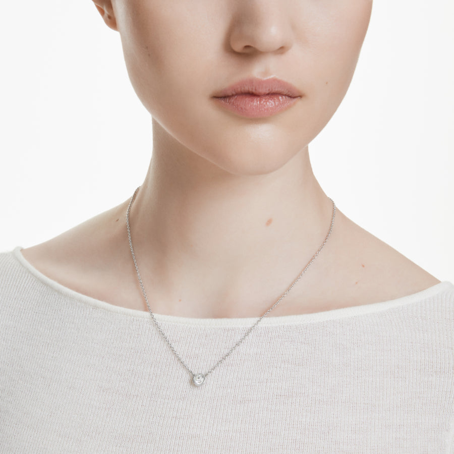 Swarovski Imber pendant with round white crystal, rhodium-plated silver, showcasing a sleek, elegant jewelry design.