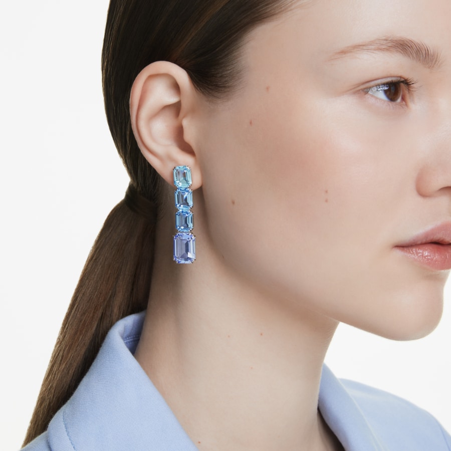 Swarovski Millenia drop earrings with octagon-cut blue crystals, color gradient, rhodium plated jewelry featuring elegant dangle design.