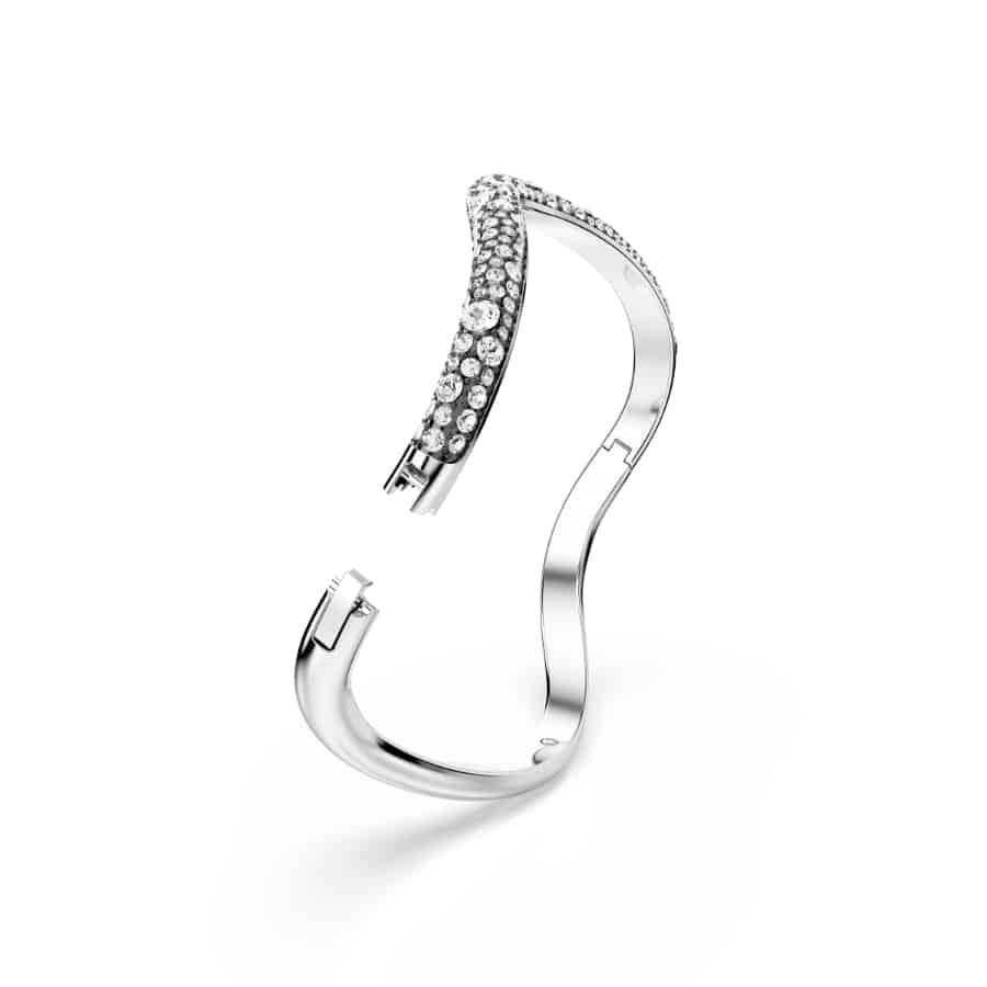Swarovski Sublima bangle with round white crystals and rhodium plating, showcasing elegant jewelry design.