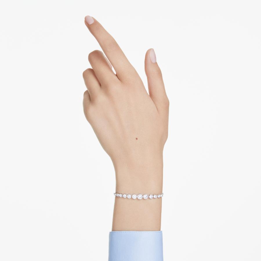 Swarovski Imber tennis bracelet featuring sparkling crystal stones on a silver-tone metal chain.