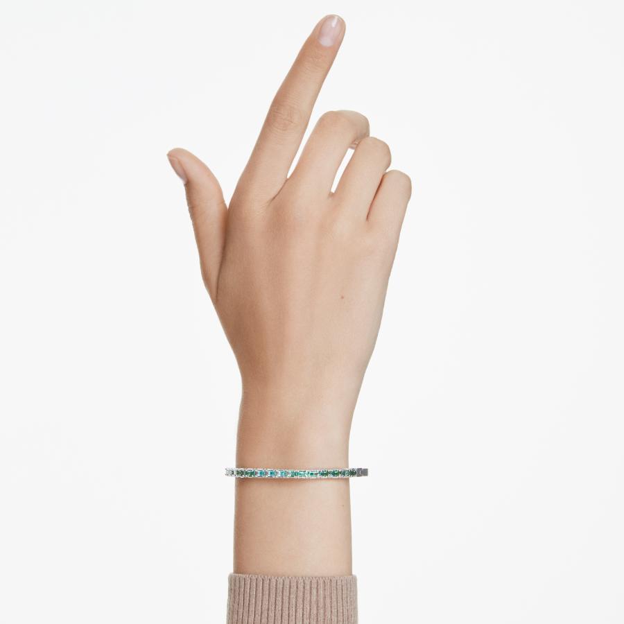 Swarovski Matrix Bangle featuring sparkling crystal accents on a sleek silver-tone metal bracelet.