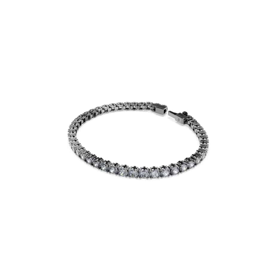 Swarovski Matrix tennis bracelet with sparkling crystal stones in a sleek silver-tone setting, close-up view of the jewelry.