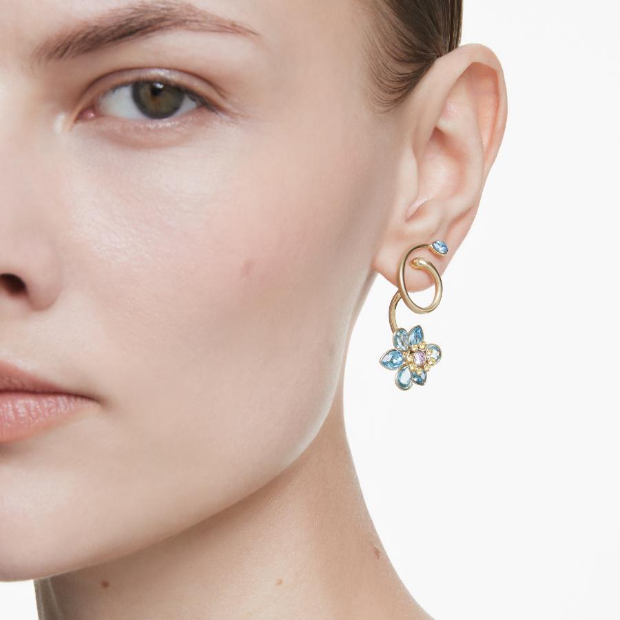 Swarovski Idyllia drop earrings with asymmetrical flower design, multicolored crystals, gold-tone plating, and mixed cuts.