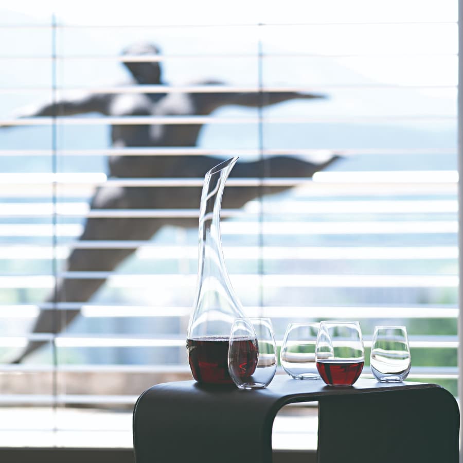 Clear Riedel Cornetto decanter with a sleek, curved glass design for wine aeration and elegant serving.