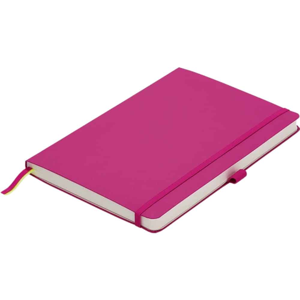 Lamy A5 softcover notebook with cream pages and black binding, open to show lined paper for writing and note-taking.