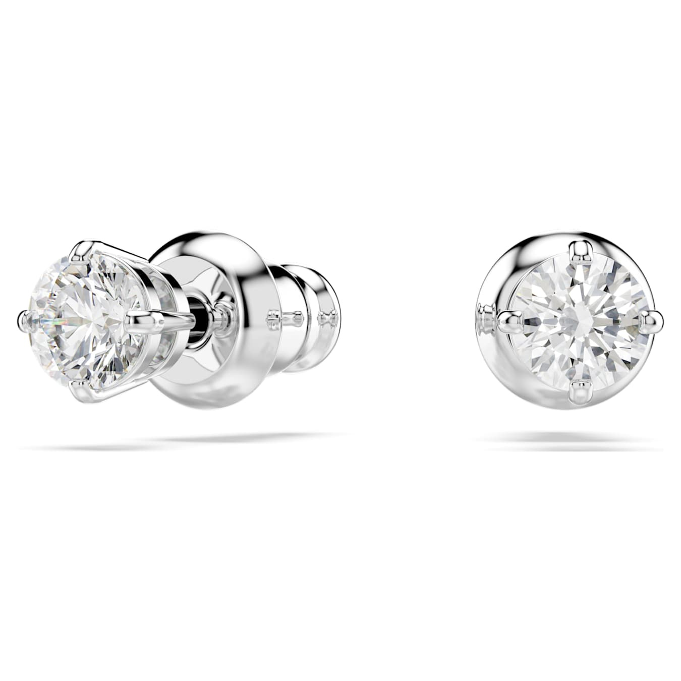 Swarovski Stilla Attract stud earrings with round white crystals and rhodium plating, showcasing elegant jewelry design.