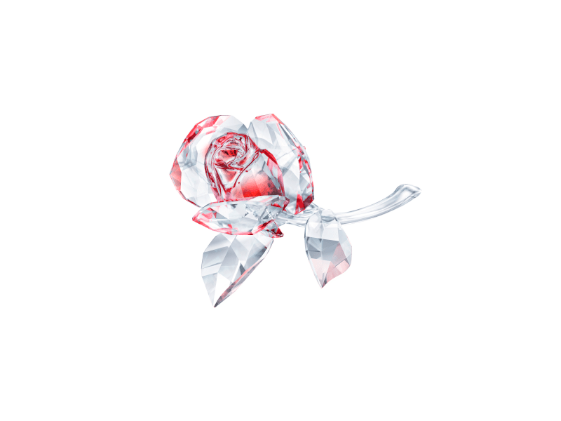 Swarovski Blossoming Rose in red crystal with detailed petals and stem, showcasing intricate craftsmanship and vibrant color.