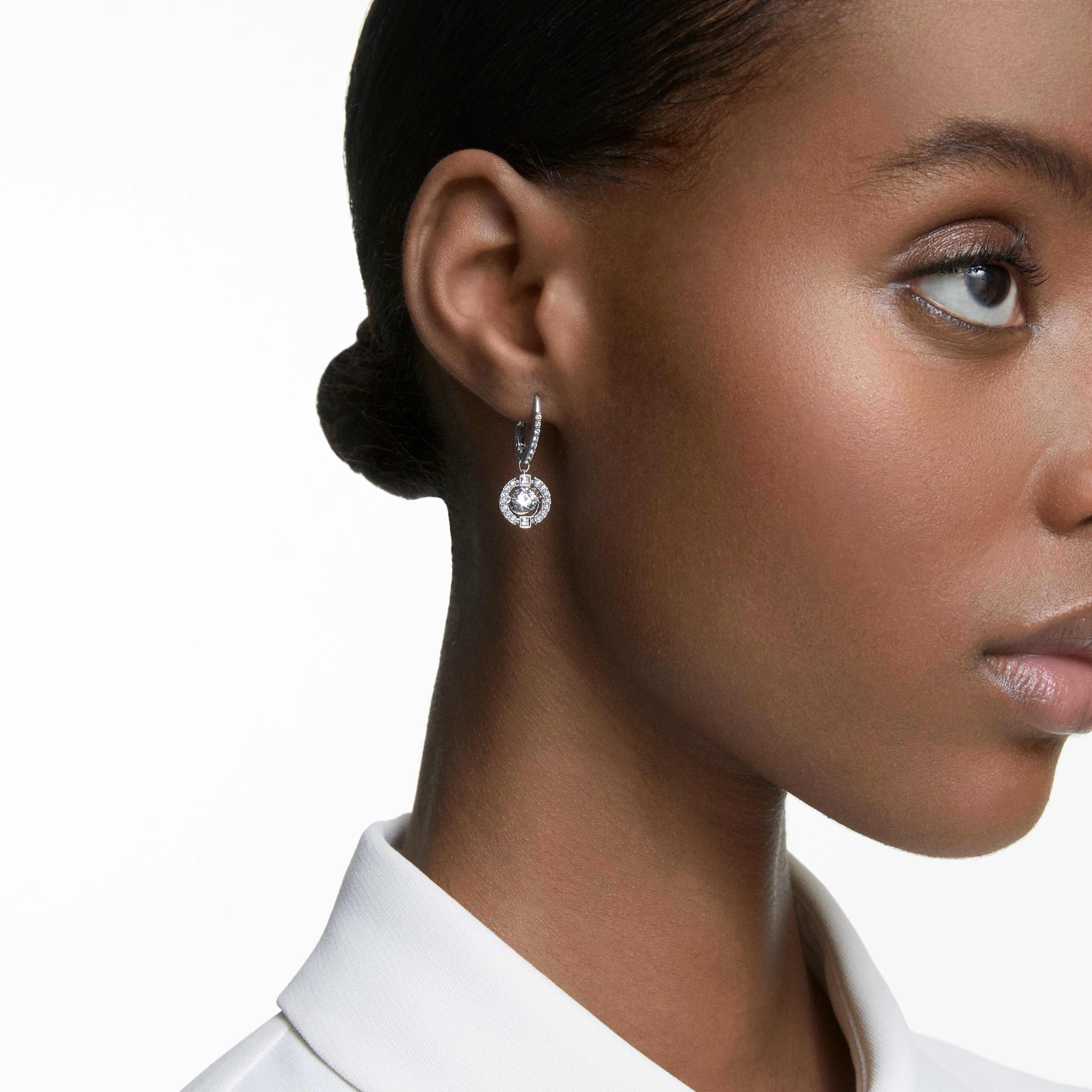 Swarovski Sparkling Dance pierced earrings in white with rhodium plating, featuring shimmering crystal accents and elegant design.