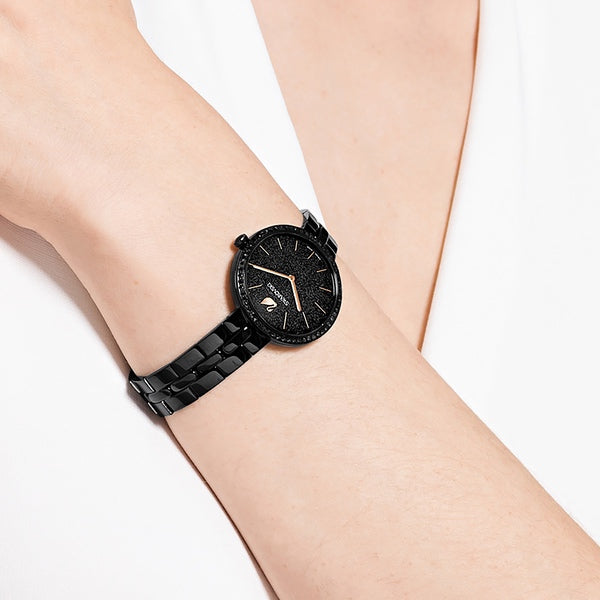 Swarovski Cosmopolitan Swiss Made watch with black metal bracelet and black finish, showcasing a sleek and elegant design.
