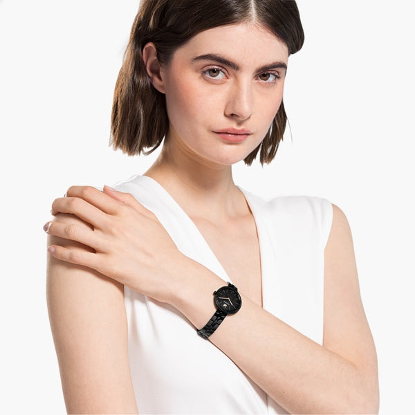 Swarovski Cosmopolitan Swiss Made watch with black metal bracelet and black finish, showcasing a sleek and elegant design.