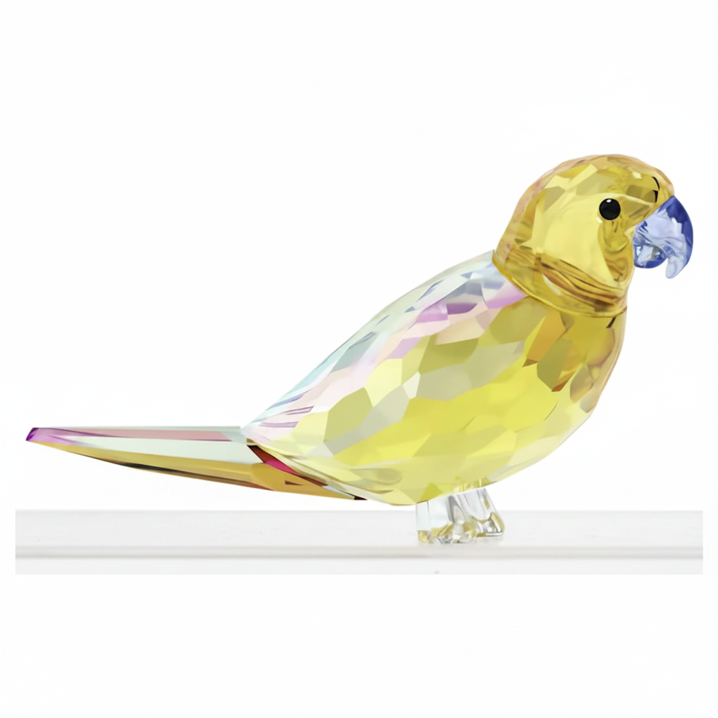 Swarovski Jungle Beats yellow parakeet Lechee crystal figurine with vibrant yellow and green accents, detailed bird sculpture.