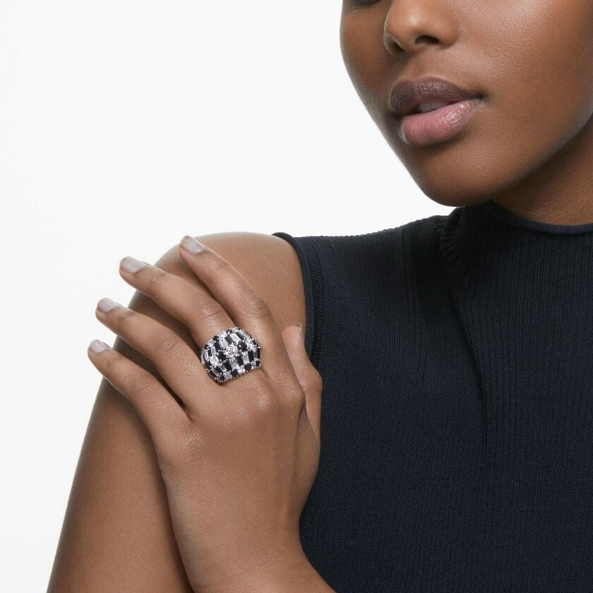 Black Swarovski Hyperbola ring with sparkling zirconia stones, rhodium-plated band, elegant jewelry accessory.